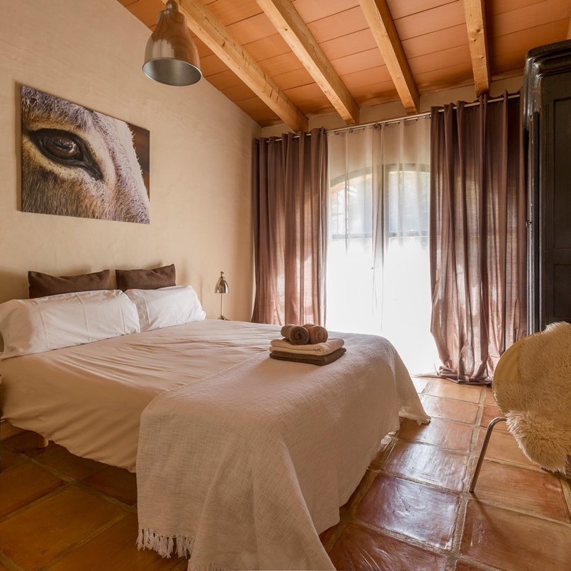 Slaapkamer in het vakantiehuis in Spanje