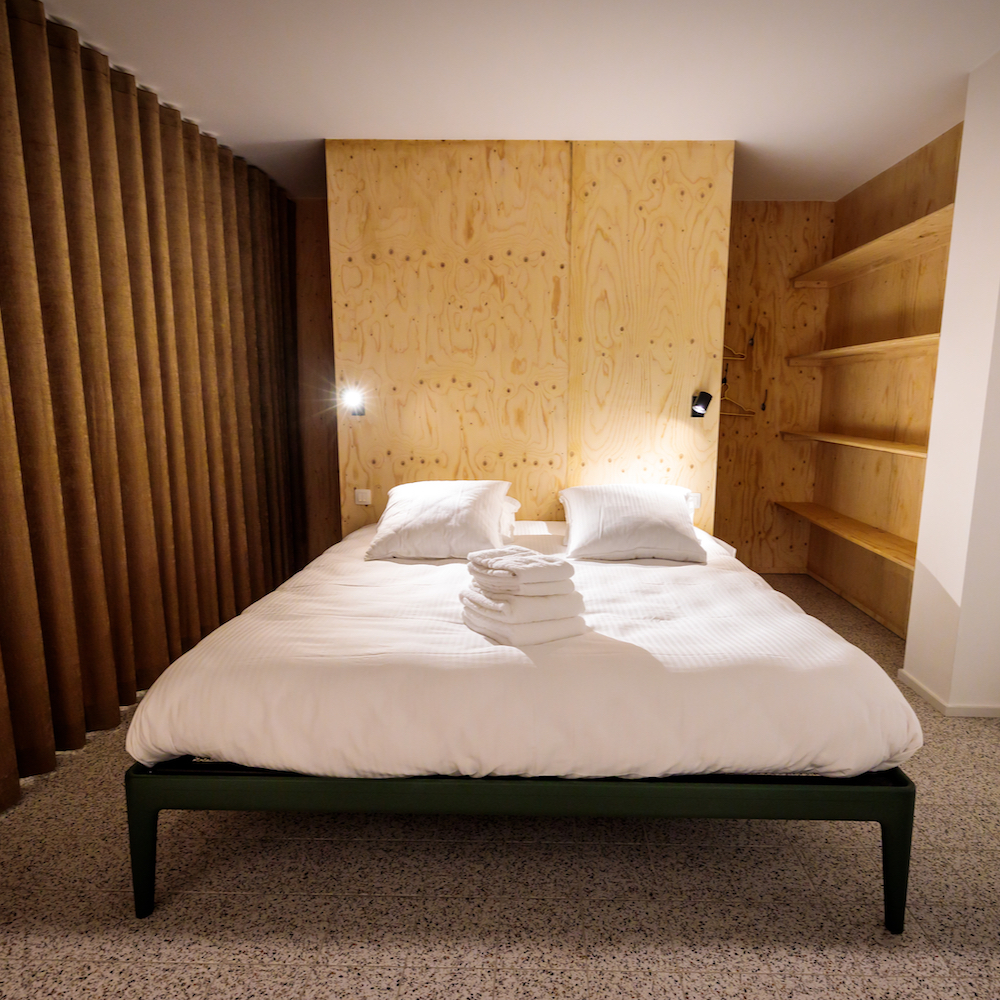 Slaapkamer in Design vakantiehuis in België aan de kust